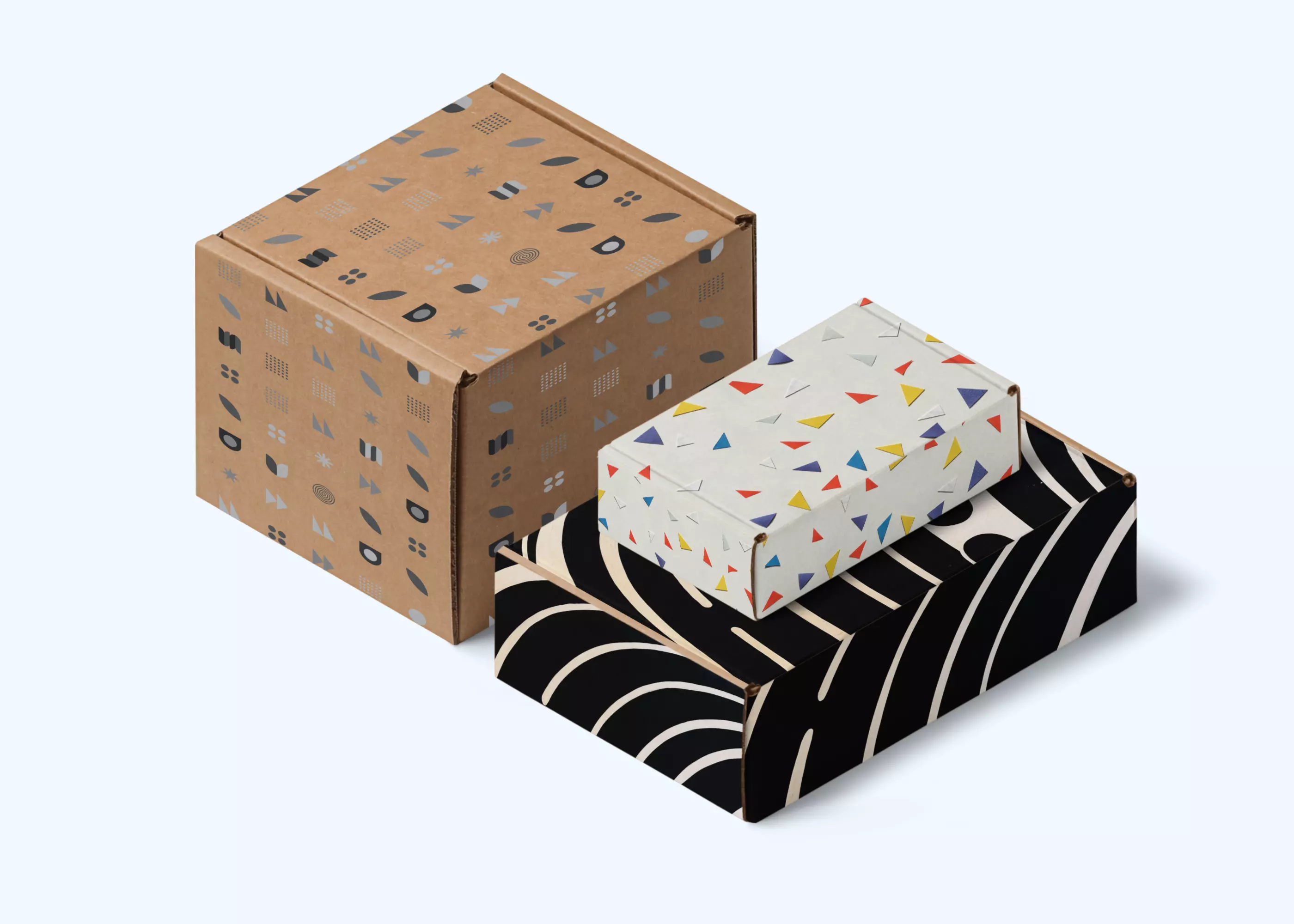 Three custom mailer boxes with kraft, multicolor and black exterior artwork